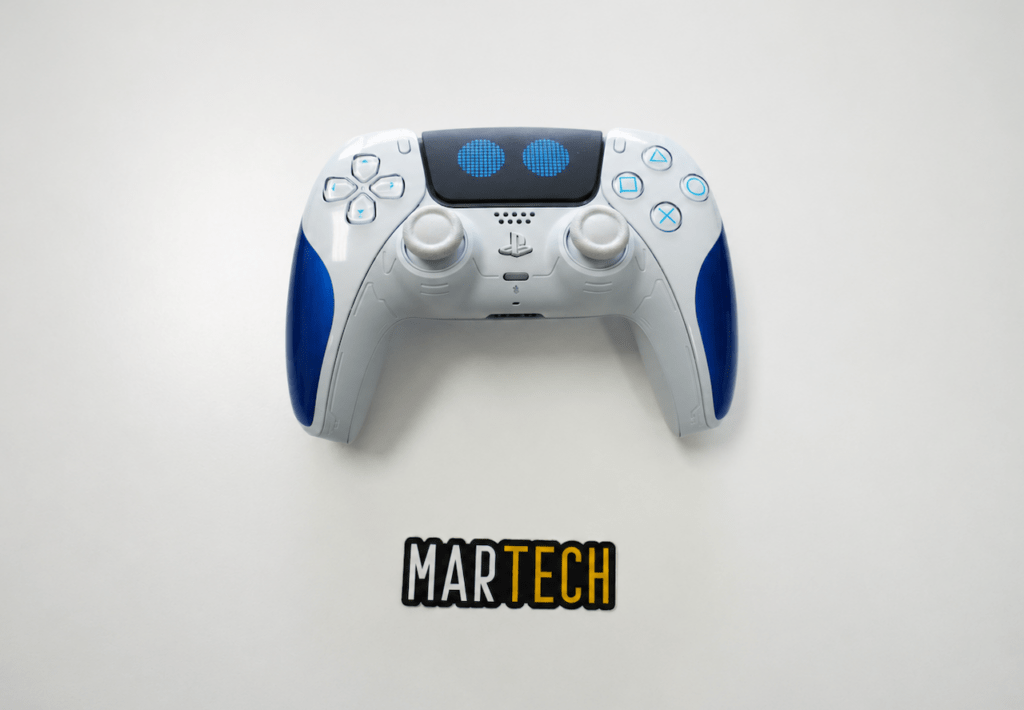 White PS5 DualSense controller with blue accents, sold for cash at MarTech in Kennesaw GA